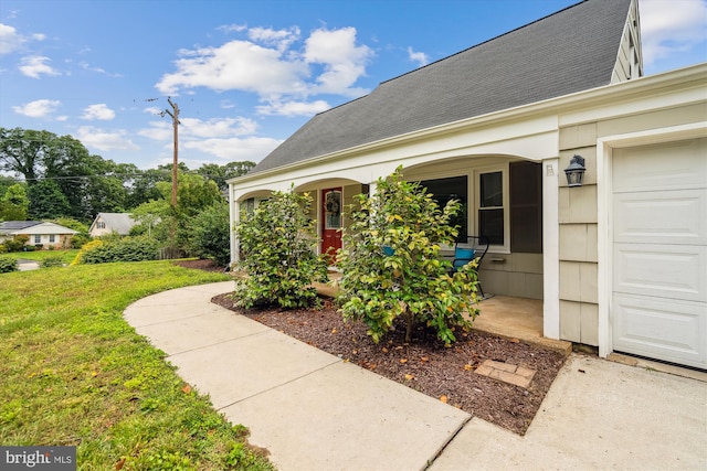13446 Overbrook Ln, Bowie, MD 20715 - entrance to property with a shingled roof, a lawn, and covered porch