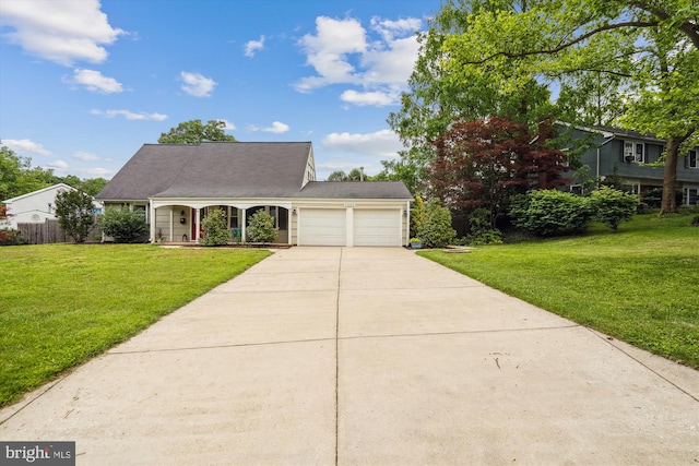 13446 Overbrook Ln, Bowie, MD 20715 - view of front facade featuring an attached garage, concrete driveway, and covered porch