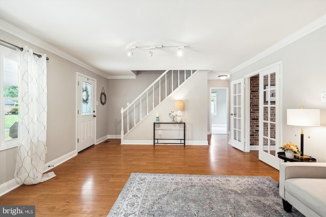 13446 Overbrook Ln, Bowie, MD 20715 - entryway featuring french doors, stairs, wood finished floors, ornamental molding, and baseboards
