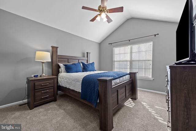 bedroom featuring ceiling fan, light carpet, baseboards, lofted ceiling, and visible vents