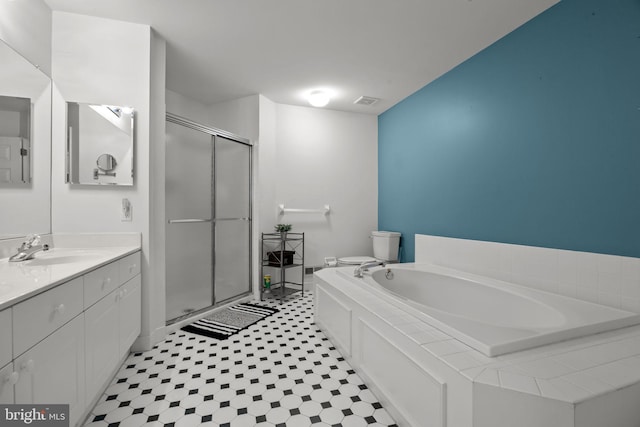 full bathroom with toilet, a shower stall, a bath, and vanity