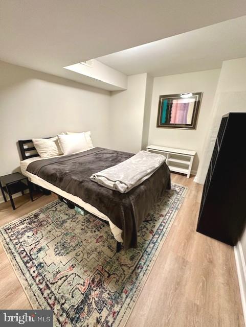 bedroom featuring light wood finished floors