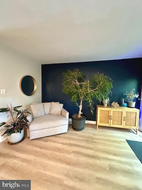living area featuring wood finished floors