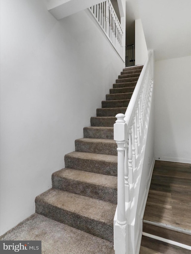 74 Red Maple Ln, Harpers Ferry, WV 25425 - stairway with baseboards and wood finished floors