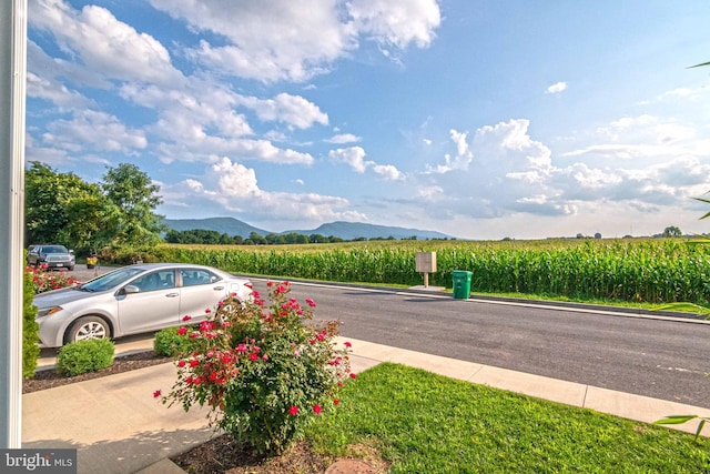 252 Parkside Ct, Woodstock, VA 22664 - view of asphalt street with agricultural plots, a view of countryside, and a mountain view