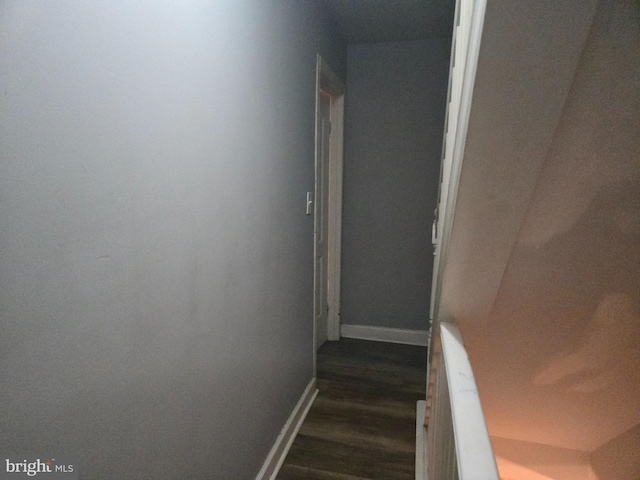 933 Bennett Pl, Baltimore, MD 21223 - staircase with wood finished floors and baseboards