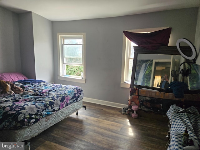 933 Bennett Pl, Baltimore, MD 21223 - bedroom featuring wood finished floors and baseboards