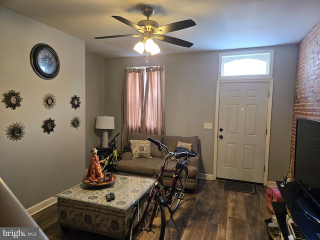 933 Bennett Pl, Baltimore, MD 21223 - living area with baseboards, dark wood finished floors, and ceiling fan
