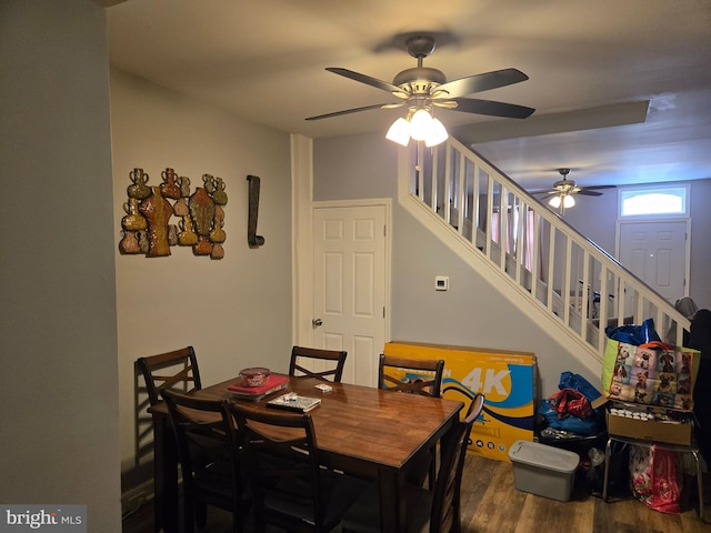 933 Bennett Pl, Baltimore, MD 21223 - dining space featuring ceiling fan, wood finished floors, and stairs