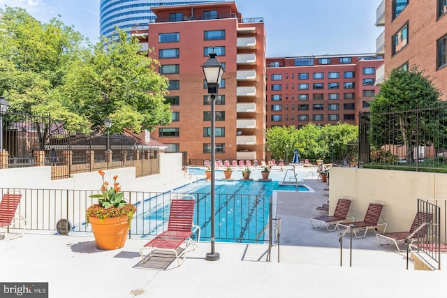 1021 Arlington Blvd Unit 237, Arlington, VA 22209 - community pool with fence and a patio