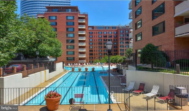 1021 Arlington Blvd Unit 237, Arlington, VA 22209 - view of swimming pool with fence