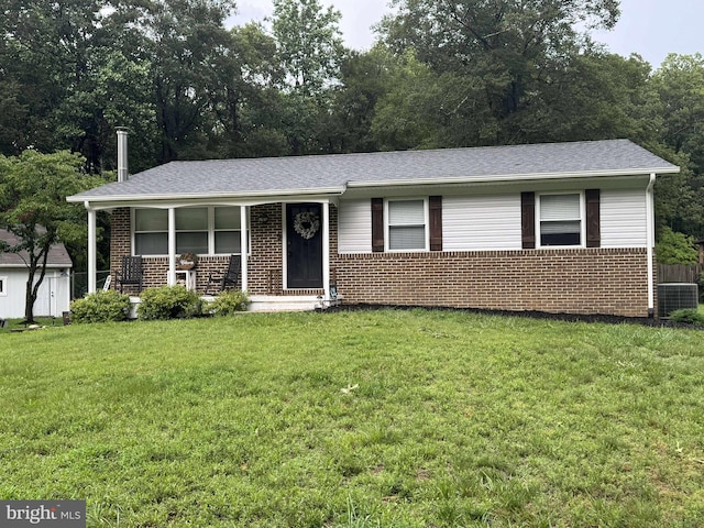 3703 Nile Rd, Davidsonville, MD 21035 - single story home with brick siding, a front yard, covered porch, and roof with shingles