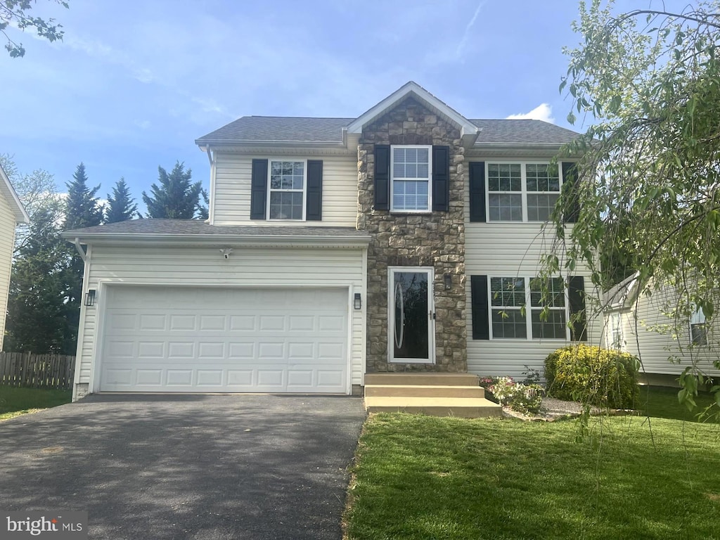 431 E Beltline Ave, Ranson, WV 25438 - view of front of property featuring asphalt driveway, a garage, and stone siding