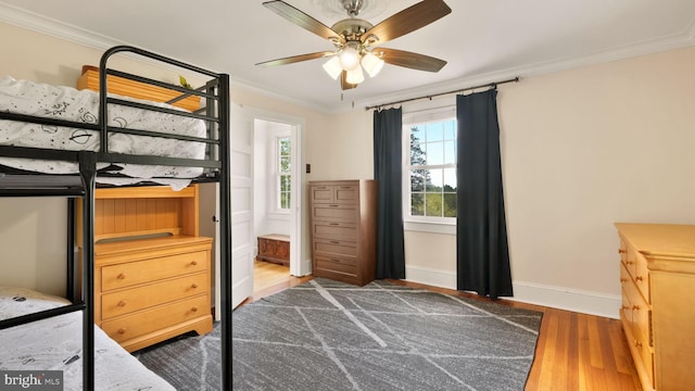 477 Linton Hill Rd, Newtown, PA 18940 - bedroom with baseboards, ornamental molding, wood finished floors, and multiple windows