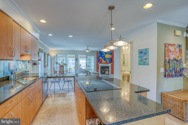 3201 Blue Heron Dr Unit 01, Rehoboth Beach, DE 19971 - kitchen with a sink, ornamental molding, a ceiling fan, recessed lighting, and a fireplace