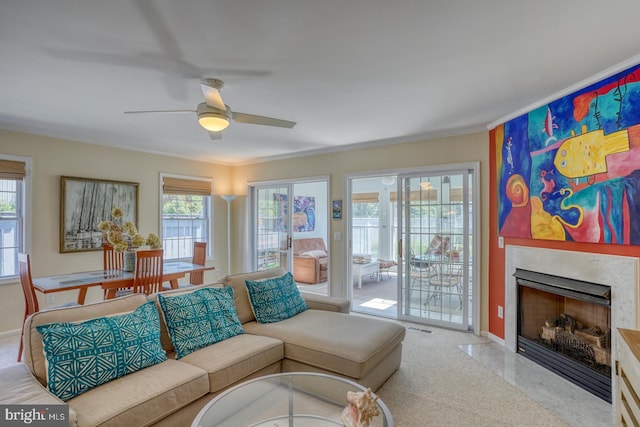 3201 Blue Heron Dr Unit 01, Rehoboth Beach, DE 19971 - living area featuring ceiling fan, a high end fireplace, baseboards, and ornamental molding