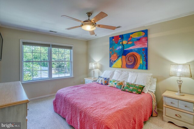 3201 Blue Heron Dr Unit 01, Rehoboth Beach, DE 19971 - carpeted bedroom featuring baseboards, ornamental molding, and a ceiling fan