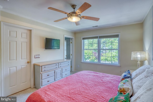 3201 Blue Heron Dr Unit 01, Rehoboth Beach, DE 19971 - bedroom with ornamental molding, light colored carpet, and ceiling fan