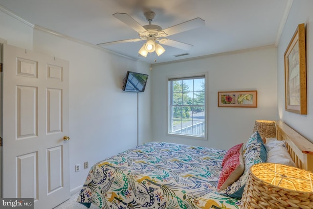 3201 Blue Heron Dr Unit 01, Rehoboth Beach, DE 19971 - carpeted bedroom with ornamental molding, a ceiling fan, and baseboards