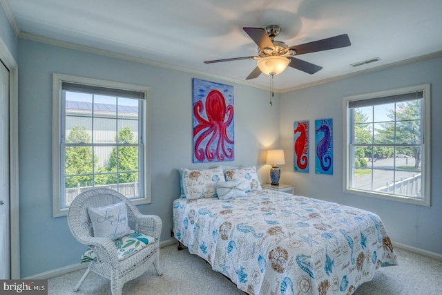 3201 Blue Heron Dr Unit 01, Rehoboth Beach, DE 19971 - carpeted bedroom with baseboards, crown molding, and ceiling fan