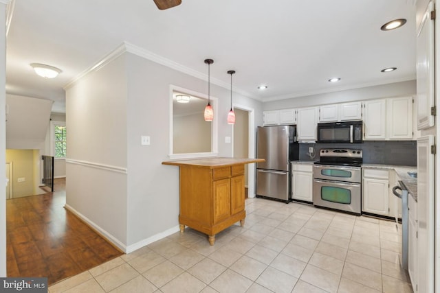 12104 Stallion Ct, Woodbridge, VA 22192 - kitchen with light countertops, white cabinetry, tasteful backsplash, hanging light fixtures, and stainless steel appliances