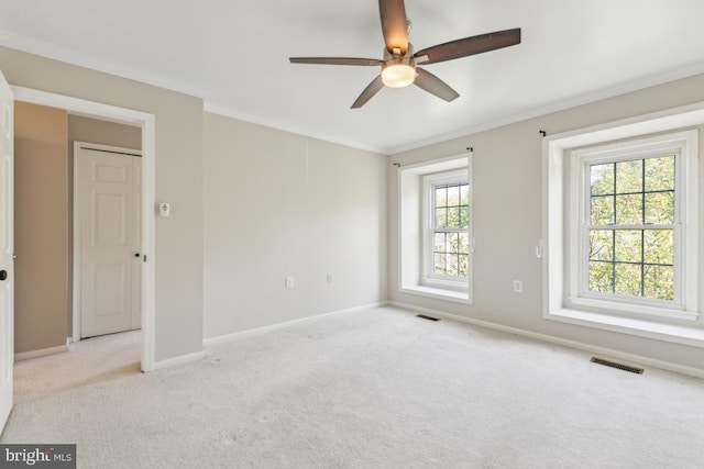 12104 Stallion Ct, Woodbridge, VA 22192 - unfurnished room featuring carpet floors, a ceiling fan, baseboards, visible vents, and ornamental molding