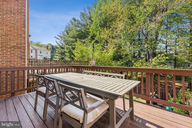 deck with outdoor dining space