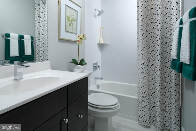 full bathroom with vanity, shower / bath combo, and toilet