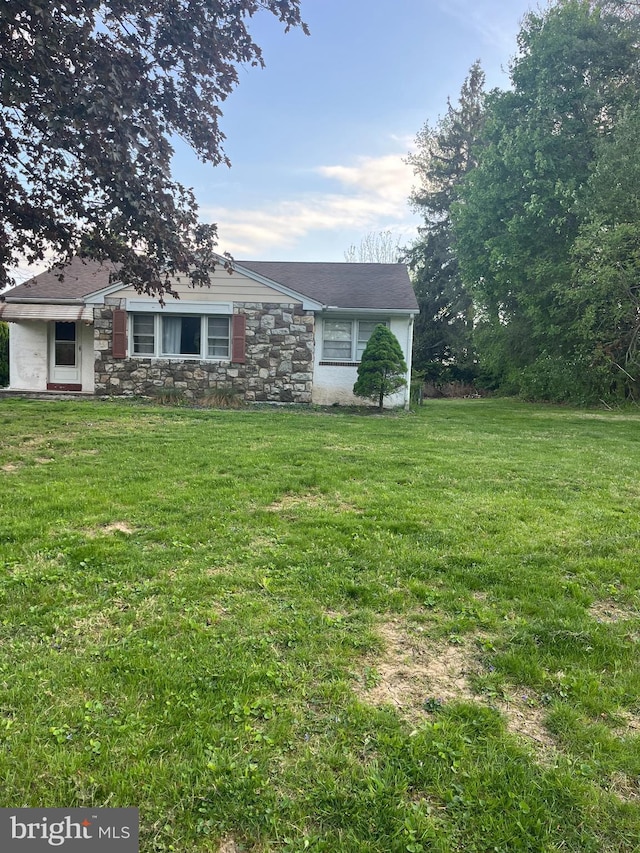 319 Kimber, Phoenixville, PA 19460 - view of front of home with a front lawn and stone siding