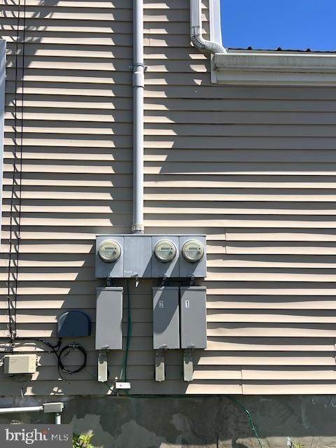 exterior details featuring electric meter