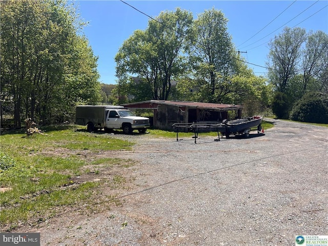 view of parking with driveway