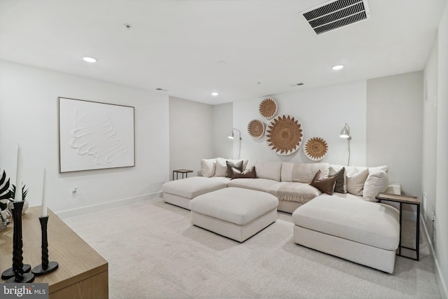 living room featuring visible vents, carpet flooring, baseboards, and recessed lighting