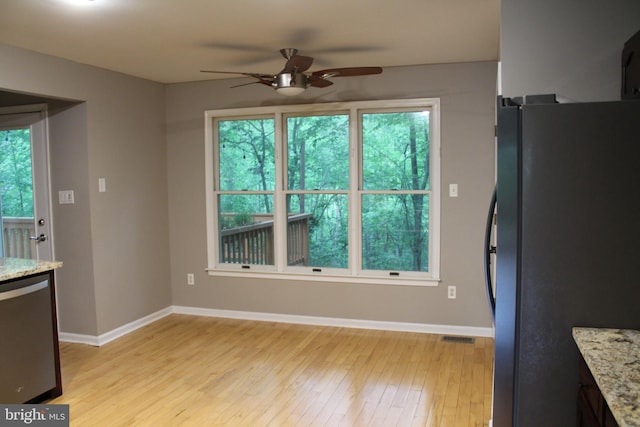 109 Hamlin Dr, Fredericksburg, VA 22405 - unfurnished dining area featuring ceiling fan, light wood-style floors, and baseboards