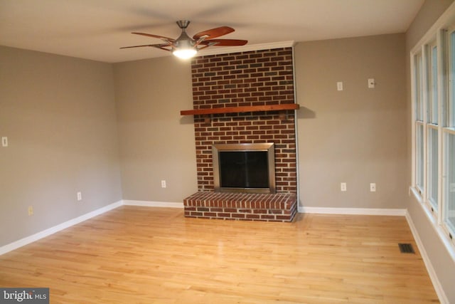 109 Hamlin Dr, Fredericksburg, VA 22405 - unfurnished living room with ceiling fan, wood finished floors, baseboards, and healthy amount of natural light