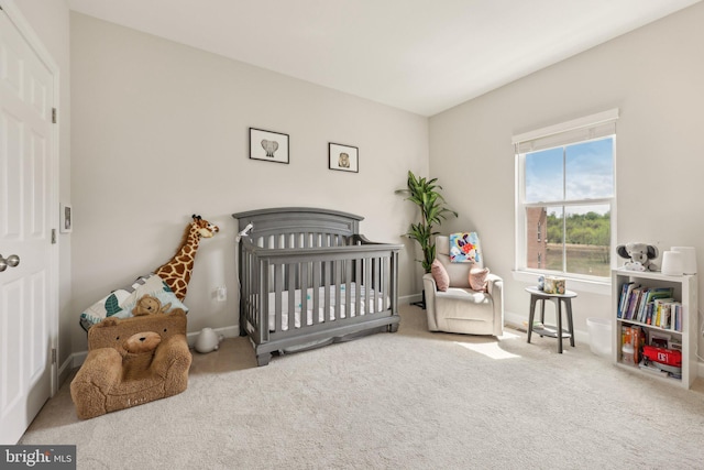 207 Community Center Ave Unit 207, Gaithersburg, MD 20878 - bedroom with carpet floors, baseboards, and a nursery area