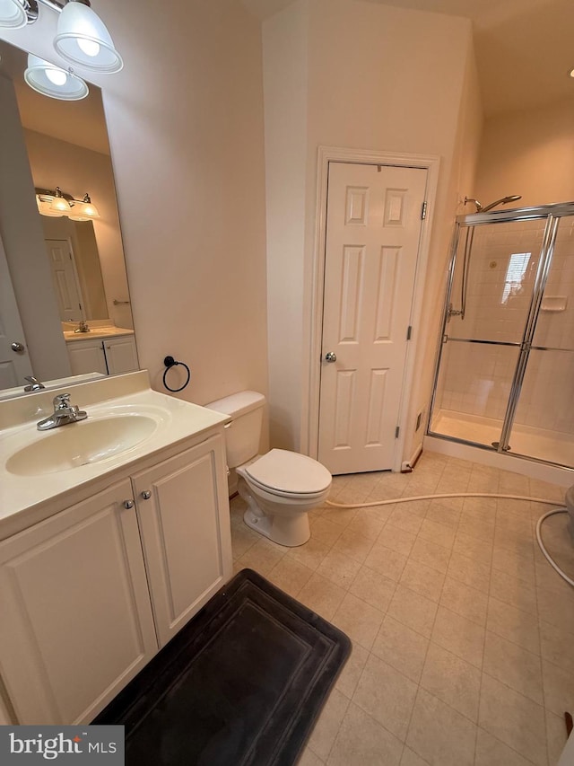 2907 Chinkapin Oak Ln Unit 245, Woodbridge, VA 22191 - full bath with a shower stall, tile patterned flooring, toilet, and vanity