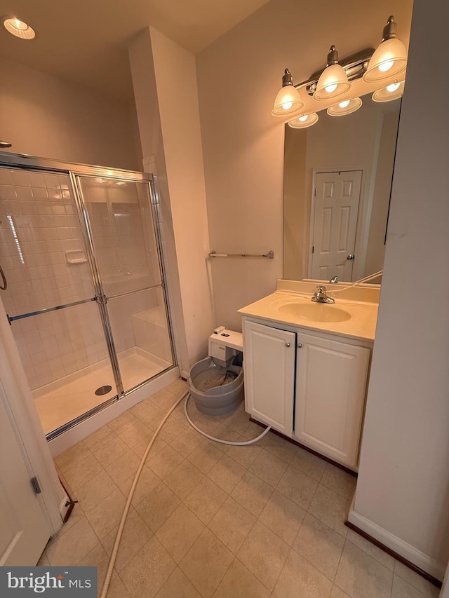 2907 Chinkapin Oak Ln Unit 245, Woodbridge, VA 22191 - full bathroom with a stall shower, vanity, tile patterned flooring, and baseboards