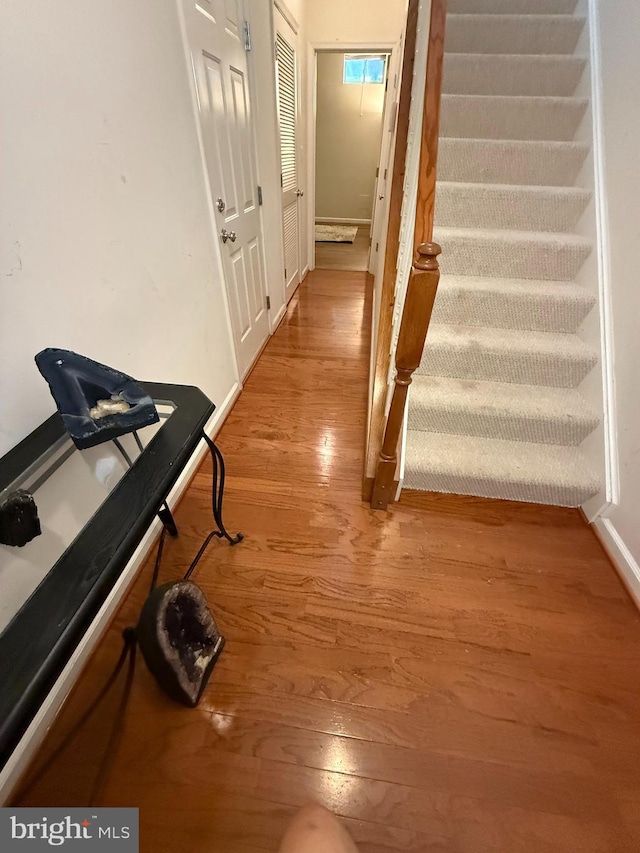 2907 Chinkapin Oak Ln Unit 245, Woodbridge, VA 22191 - hallway featuring light wood-style floors and stairway