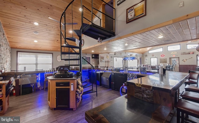 4547 Red Rock Rd, Benton, PA 17814 - kitchen featuring wood ceiling, a breakfast bar, high vaulted ceiling, and wood finished floors