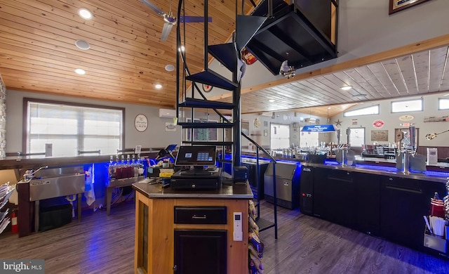 4547 Red Rock Rd, Benton, PA 17814 - kitchen with lofted ceiling, a kitchen island, dark countertops, dark wood-style floors, and wood ceiling