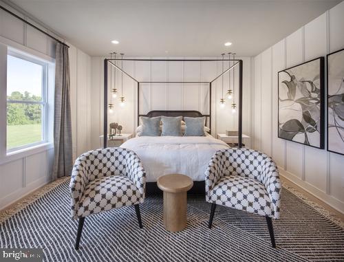 carpeted bedroom featuring a decorative wall