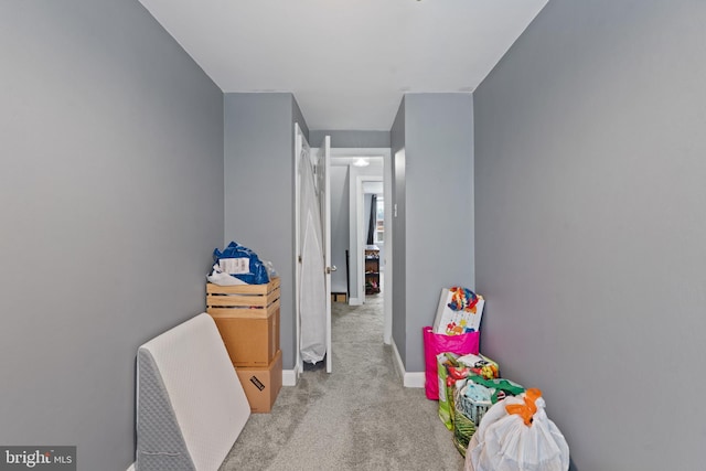 playroom featuring baseboards and carpet