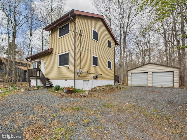 4105 Wilcox Ct, Pocono Lake, PA 18347 - view of side of property with crawl space, an outdoor structure, and a detached garage