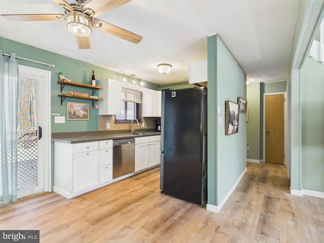 4105 Wilcox Ct, Pocono Lake, PA 18347 - kitchen featuring a sink, freestanding refrigerator, open shelves, dishwasher, and white cabinetry