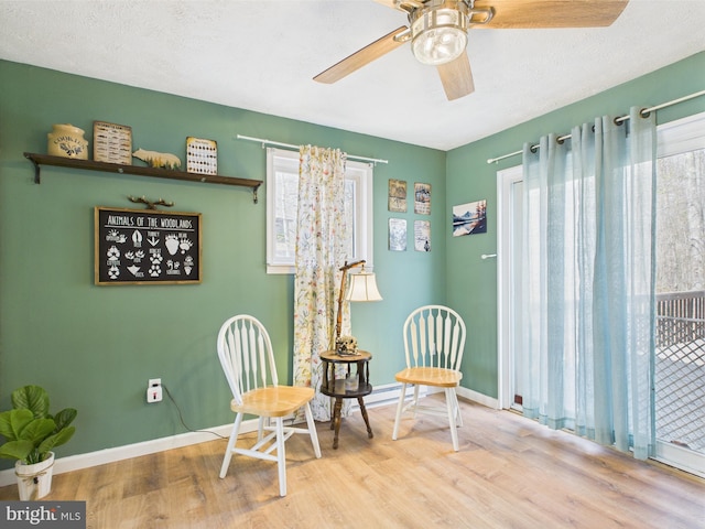 4105 Wilcox Ct, Pocono Lake, PA 18347 - sitting room with baseboards, a ceiling fan, and wood finished floors