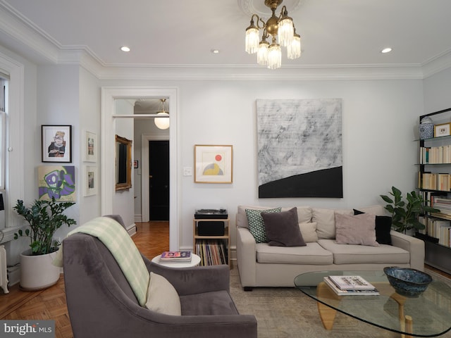 living area featuring recessed lighting, an inviting chandelier, and ornamental molding