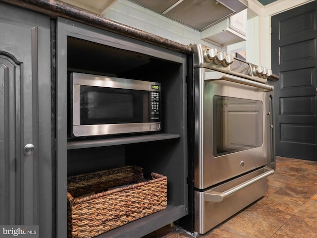interior space featuring stainless steel microwave