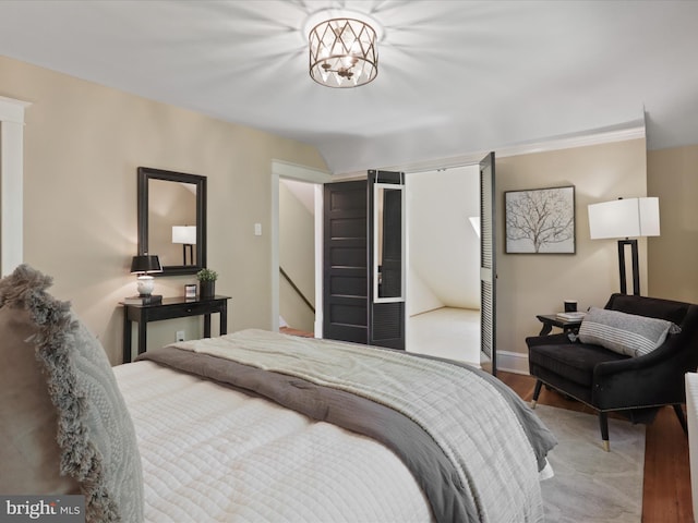 bedroom featuring a closet and wood finished floors