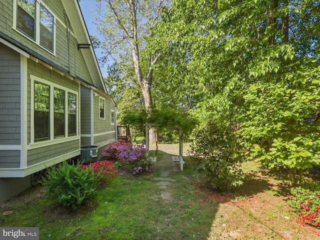 view of yard featuring cooling unit