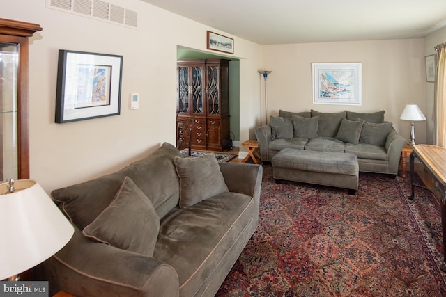 living room featuring visible vents